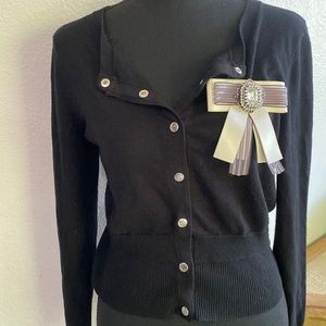 Cable& gauge, black cardigan with silver button details, broche is removable